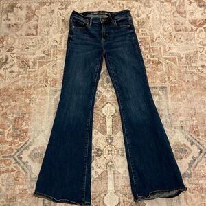 American Eagle Next Level Stretch Low Rise Flare Dark Blue Size 0 Regular